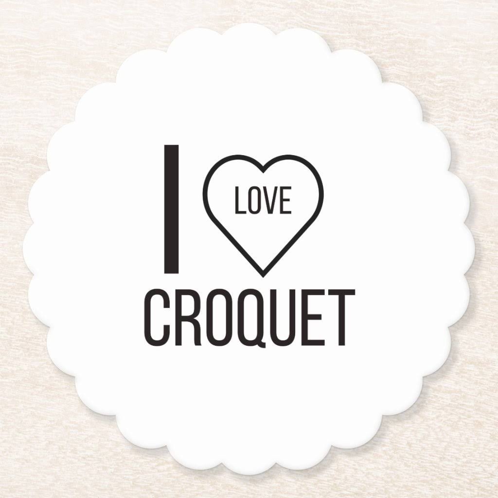 I love croquet text with heart symbol on white scalloped badge