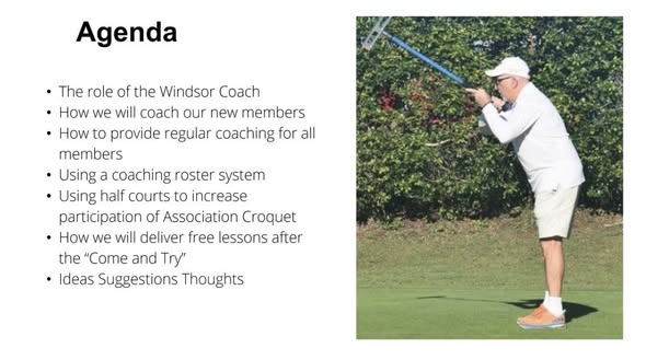 A man in white attire swings a croquet mallet on a grassy court, demonstrating a stroke during a coaching session