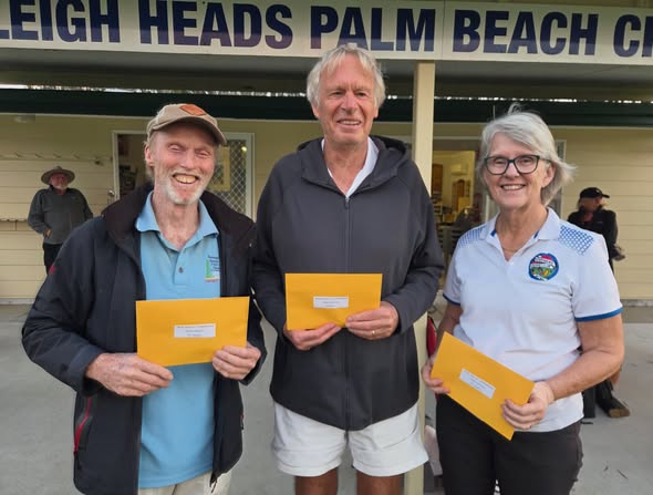 Three people hold yellow envelopes at the Leigh Heads Palm Beach Croquet Club, likely receiving awards