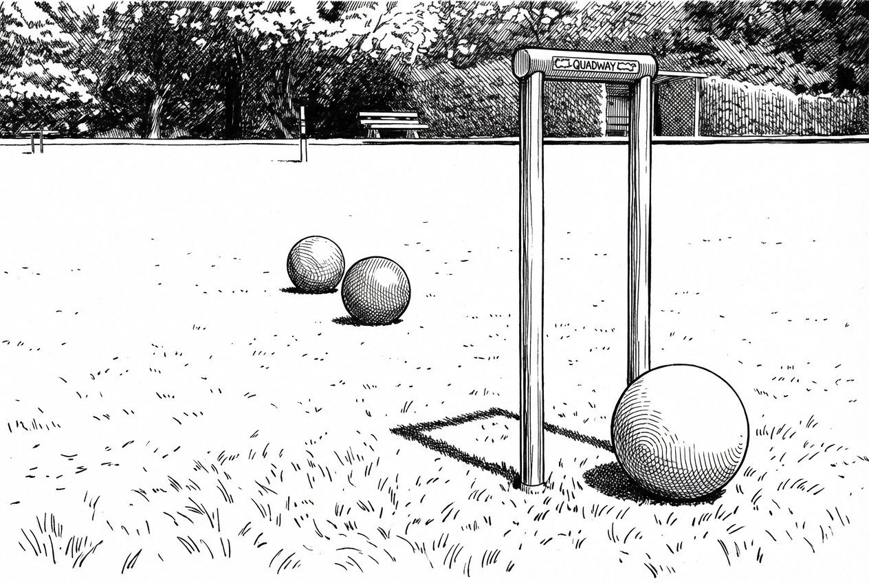 Croquet balls and mallet on club lawn with hoop and ball positioned near gateway structure