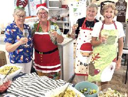 Photo above-Cathy (2nd L) and happy elves