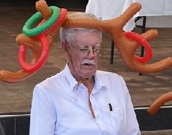 Keith McLeod wore the reindeer antlers and coloured 'rings' were tossed onto the antlers.