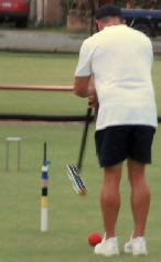 Photo right:- Shane lining up for his winning shot